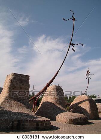 Stock Image -  Winnipeg, Canada, MB, Manitoba, sculpture, Meeting Place, The Forks, junction of Red River and Assiniboine River. Fotosearch