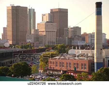 Stock Photograph -  Winnipeg, Canada, MB, Manitoba, Downtown, from The Forks, junction of Red River and Assiniboine River. Fotosearch