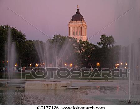Stock Photograph -  Winnipeg, Canada, MB, Manitoba, Manitoba Legislative Building, evening, fountain. Fotosearch