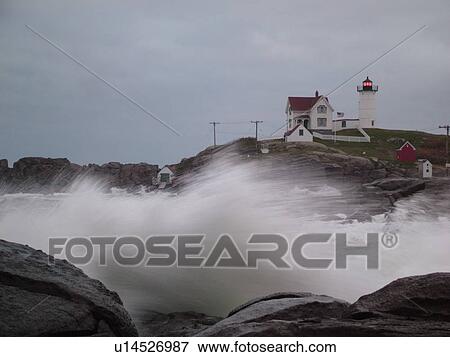 York Beach, ME, Maine, Cape Neddick Nubble Light, Lighthouse, morning, dawn, waves crashing against the rocky coast View Large Photo Image Stock Photo - York Beach, ME, Maine, Cape Neddick Nubble Light, Lighthouse, morning, dawn, waves crashing against the rocky coast. Fotosearch