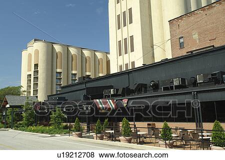 Stock Photo -  Akron, OH, Ohio, downtown, Quaker Square, Crown Plaza Hotel, outdoor cafT. Fotosearch
