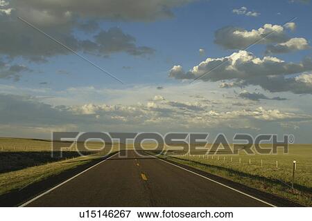 Stock Photo -  Albany County, WY, Wyoming, road, prairie, open range. Fotosearch
