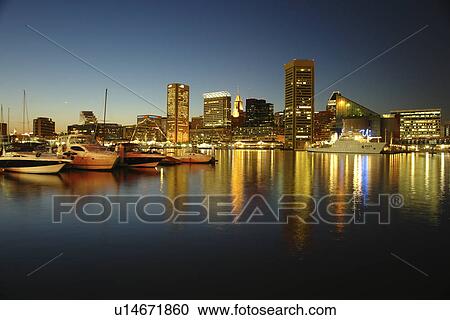 Stock Image -  Baltimore, MD, Maryland, Chesapeake Bay, Downtown Skyline, Inner Harbor, evening. Fotosearch