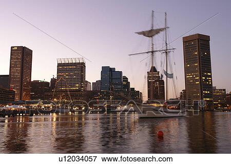 Stock Photo -  Baltimore, MD, Maryland, Chesapeake Bay, Downtown Skyline, Inner Harbor, evening. Fotosearch