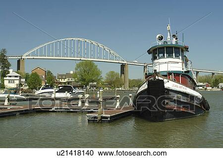 Chesapeake City, MD, Maryland, Chesapeake Bay, Chesapeake & Delaware Canal, marina, bridge, tugboat View Large Photo Image Stock Image - Chesapeake City, MD, Maryland, Chesapeake Bay, Chesapeake & Delaware Canal, marina, bridge, tugboat. Fotosearch