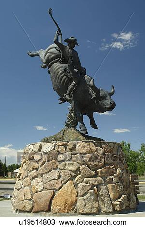 Stock Image -  Cheyenne, WY, Wyoming, Rodeo statue at Cheyenne Frontier Days Old West Museum. Fotosearch