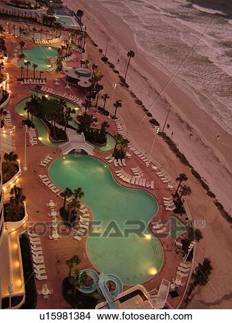 Daytona Beach, FL, Florida, Atlantic Ocean, aerial, swimming pools, pool lights, Fairfield Resorts at Ocean Walk, Ocean Walk Resorts, beaches, evening View Large Photo Image Picture - Daytona Beach, FL, Florida, Atlantic Ocean, aerial, swimming pools, pool lights, Fairfield Resorts at Ocean Walk, Ocean Walk Resorts, beaches, evening. Fotosearch