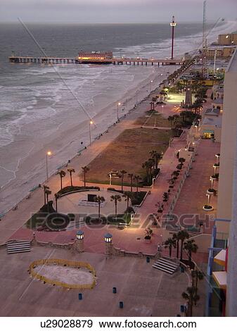 Stock Photo -  Daytona Beach, FL, Florida, Atlantic Ocean, beaches, Main Street Pier & Boardwalk, aerial, Ocean Walk, evening. Fotosearch