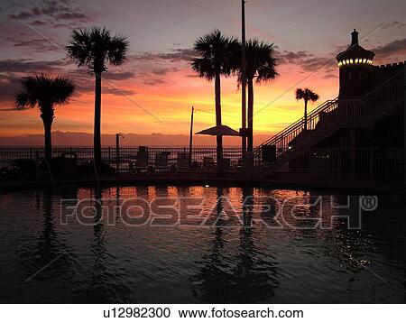Daytona Beach, FL, Florida, Daytona Beach Shores, Atlantic Ocean, Fairfield Resorts at Ocean Walk, Ocean Walk Resorts, sunrise, water, swimming pool View Large Photo Image Stock Image - Daytona Beach, FL, Florida, Daytona Beach Shores, Atlantic Ocean, Fairfield Resorts at Ocean Walk, Ocean Walk Resorts, sunrise, water, swimming pool. Fotosearch