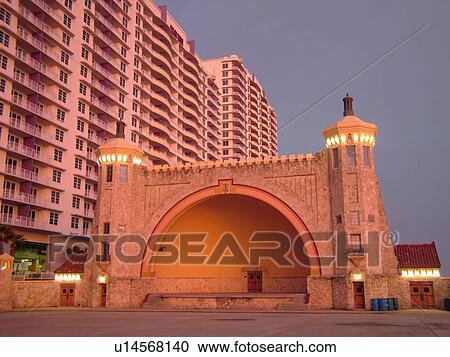 Stock Image -  Daytona Beach, FL, Florida, Daytona Beach Shores, Atlantic Ocean, Fairfield Resorts at Ocean Walk, Ocean Walk Resorts, Bandshell, Music Band Stand, sunrise. Fotosearch