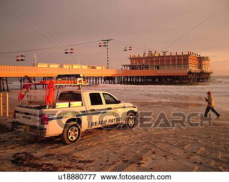Daytona Beach, FL, Florida, Daytona Beach Shores, Atlantic Ocean, Main Street Pier & Boardwalk, Ocean Pier, Beach Patrol truck View Large Photo Image Stock Photo - Daytona Beach, FL, Florida, Daytona Beach Shores, Atlantic Ocean, Main Street Pier & Boardwalk, Ocean Pier, Beach Patrol truck. Fotosearch