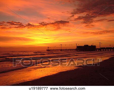 Stock Photo -  Daytona Beach, FL, Florida, Daytona Beach Shores, Atlantic Ocean, Main Street Pier & Boardwalk, beaches, sunrise. Fotosearch