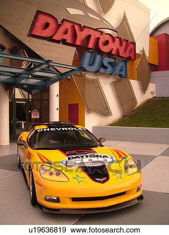 Stock Photo -  Daytona Beach, FL, Florida, Daytona International Speedway, Daytona USA, World Center of Racing, yellow Corvette advertising Daytona 500 car race. Fotosearch