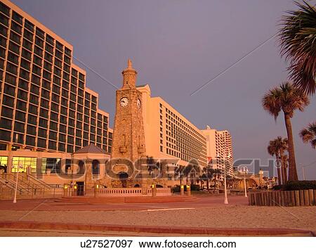 Stock Photo -  Daytona Beach, FL, Florida, Daytona Beach Shores, Atlantic Ocean, Ocean Walk, clock tower, resorts, morning light. Fotosearch