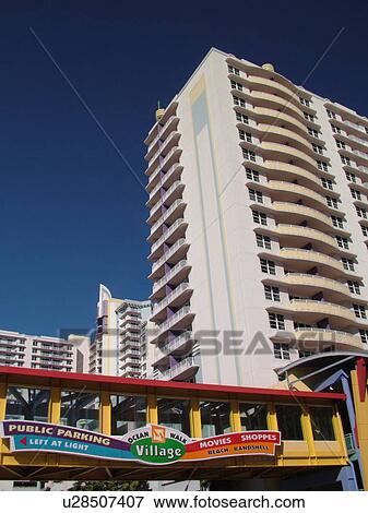 Stock Photo -  Daytona Beach, FL, Florida, Daytona Beach Shores, Atlantic Ocean, Fairfield Resorts at Ocean Walk, Luxury Hotel Suites, Ocean Walk Village, pedestrian bridge. Fotosearch