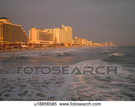 Stock Photography -  Daytona Beach, FL, Florida, Daytona Beach Shores, Atlantic Ocean, beaches, sunrise, resorts. Fotosearch