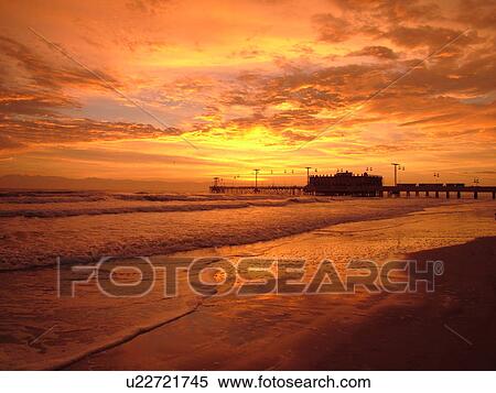 Stock Photography -  Daytona Beach, FL, Florida, Daytona Beach Shores, Atlantic Ocean, Main Street Pier & Boardwalk, beaches, sunrise. Fotosearch