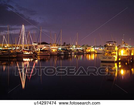 Picture -  Daytona Beach, FL, Florida, Halifax Harbor, marina, boats, evening. Fotosearch