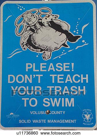 Stock Image -  Daytona Beach, FL, Florida, marina, regulatory sign, Please Don't Teach Your Trash to Swim. Fotosearch