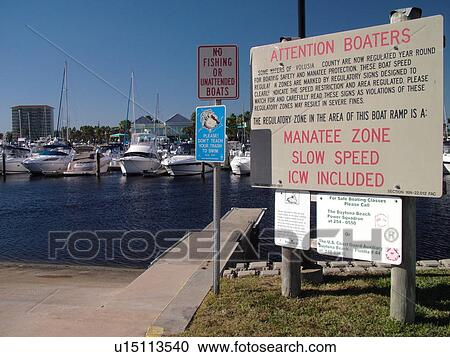 Daytona Beach, FL, Florida, marina, regulatory sign, Attention Boaters, Manatee Zone, protect wildlife, No fishing or Unattended Boats View Large Photo Image Stock Image - Daytona Beach, FL, Florida, marina, regulatory sign, Attention Boaters, Manatee Zone, protect wildlife, No fishing or Unattended Boats. Fotosearch