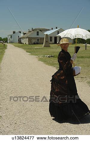 Stock Photo -  Fort Laramie, WY, Wyoming, Fort Laramie National Historic Site, pioneer woman. Fotosearch