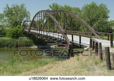 Fort Laramie, WY, Wyoming, Laramie River, footbridge View Large Photo Image Picture - Fort Laramie, WY, Wyoming, Laramie River, footbridge. Fotosearch