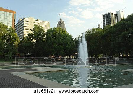 Stock Image -  Fort Wayne, IN, Indiana, downtown, public plaza, fountain, skyline. Fotosearch
