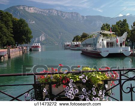 France, Annecy, Haute-Savoie, Rhone-Alpes, Europe, Lake Annecy, Lac d' Annecy, excursion boats, Lakeside park, mountains, flower boxes View Large Photo Image Stock Image - France, Annecy, Haute-Savoie, Rhone-Alpes, Europe, Lake Annecy, Lac d' Annecy, excursion boats, Lakeside park, mountains, flower boxes. Fotosearch