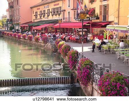 France, Annecy, Haute-Savoie, Rhone-Alpes, Europe, Thiou Canal, flower-covered pedestrian streets, restaurants, outdoor cafT, village, old quarter View Large Photo Image Stock Image - France, Annecy, Haute-Savoie, Rhone-Alpes, Europe, Thiou Canal, flower-covered pedestrian streets, restaurants, outdoor cafT, village, old quarter. Fotosearch