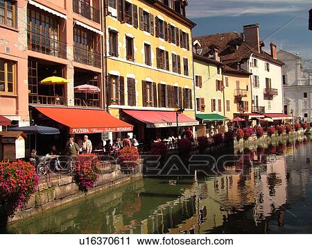Stock Image -  France, Annecy, Haute-Savoie, Rhone-Alpes, Europe, village, Thiou Canal, restaurants, outdoor cafTs. Fotosearch