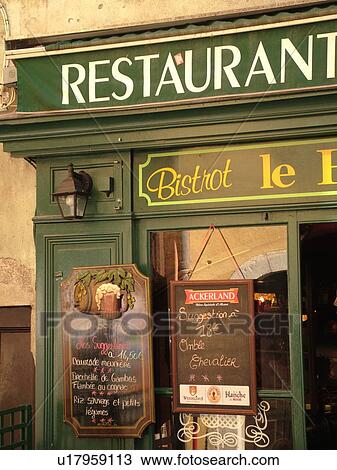 Stock Image -  France, Annecy, Haute-Savoie, Rhone-Alpes, Europe, village, bistrot, restaurant, outdoor cafT, menu boards. Fotosearch