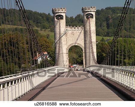 Stock Photo -  France, Annecy, Haute-Savoie, Rhone-Alpes, Europe, Pont de la Caille or Charles-Albert built in 1839 now a pedestrian bridge, suspension bridge. Fotosearch
