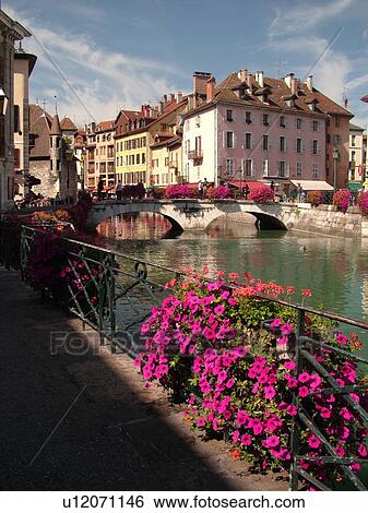France, Annecy, Haute-Savoie, Rhone-Alpes, Europe, Thiou Canal, village, old quarter, flower-covered bridges and pedestrian streets View Large Photo Image Stock Photograph - France, Annecy, Haute-Savoie, Rhone-Alpes, Europe, Thiou Canal, village, old quarter, flower-covered bridges and pedestrian streets. Fotosearch