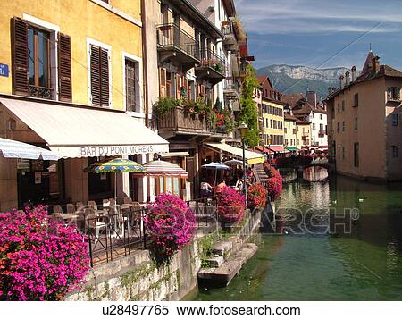 Stock Photography -  France, Annecy, Haute-Savoie, Rhone-Alpes, Europe, village, Thiou Canal, restaurants, outdoor cafTs. Fotosearch