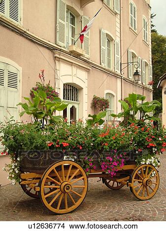 France, Beaujeu, Rhone-Alpes, Europe, Heart of Beaujolais, flowers decorate the village, wagon View Large Photo Image Picture - France, Beaujeu, Rhone-Alpes, Europe, Heart of Beaujolais, flowers decorate the village, wagon. Fotosearch