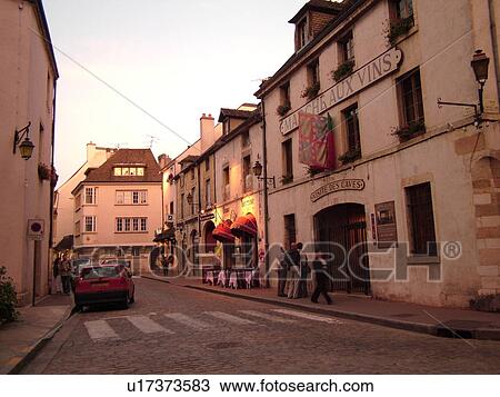 Stock Image -  France, Beaune, Burgundy, Cote de Beaune, Cote d'Or, Europe, Burgundy Wine Region, downtown, Marche Aux vin, evening. Fotosearch