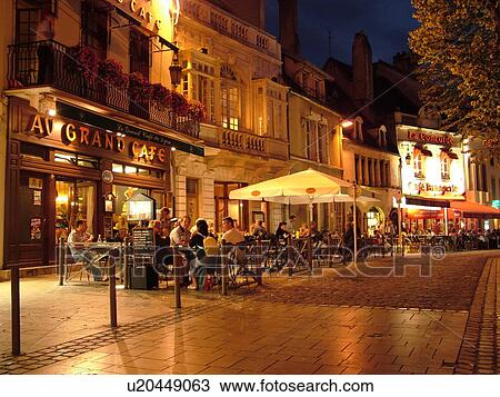 Stock Image -  France, Beaune, Burgundy, Cote de Beaune, Cote d'Or, Europe, Burgundy Wine Region, outdoor cafT, downtown, evening. Fotosearch