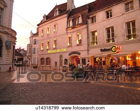 Stock Photo -  France, Beaune, Burgundy, Cote de Beaune, Cote d'Or, Europe, Burgundy Wine Region, downtown, evening. Fotosearch