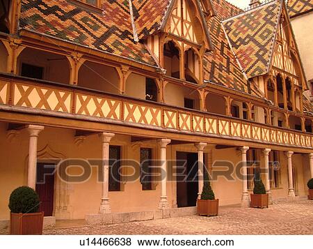 Stock Photo -  France, Beaune, Burgundy, Cote de Beaune, Cote d'Or, Europe, Burgundy Wine Region, downtown, Hotel-Dieu. Fotosearch