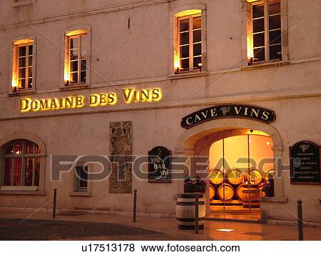 Stock Photo -  France, Beaune, Burgundy, Cote de Beaune, Cote d'Or, Europe, Burgundy Wine Region, downtown, evening, Domaine des Vins. Fotosearch