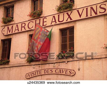 Stock Photo -  France, Beaune, Burgundy, Cote de Beaune, Cote d'Or, Europe, Burgundy Wine Region, downtown, Marche Aux Vins. Fotosearch