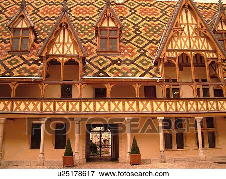 Stock Photo -  France, Beaune, Burgundy, Cote de Beaune, Cote d'Or, Europe, Burgundy Wine Region, downtown, Hotel-Dieu. Fotosearch
