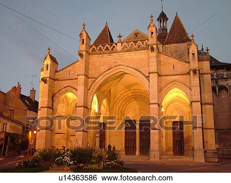 Stock Photograph -  France, Beaune, Burgundy, Cote de Beaune, Cote d'Or, Europe, Burgundy Wine Region, downtown, evening, church. Fotosearch