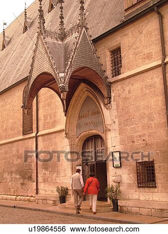 Stock Photograph -  France, Beaune, Burgundy, Cote de Beaune, Cote d'Or, Europe, Burgundy Wine Region, downtown, Hotel-Dieu. Fotosearch