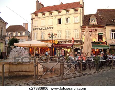 Stock Photograph -  France, Beaune, Burgundy, Cote de Beaune, Cote d'Or, Europe, Burgundy Wine Region, downtown, outdoor cafT. Fotosearch