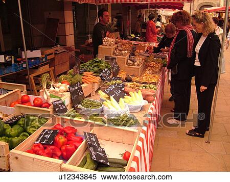 Stock Photography -  France, Beaune, Burgundy, Cote de Beaune, Cote d'Or, Europe, Burgundy Wine Region, downtown, City Market. Fotosearch