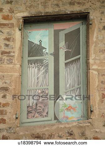 France, Chatillon, Ain, Rhone-Alpes, Europe, decals of cat, fish bowl and bird View Large Photo Image Picture - France, Chatillon, Ain, Rhone-Alpes, Europe, decals of cat, fish bowl and bird. Fotosearch