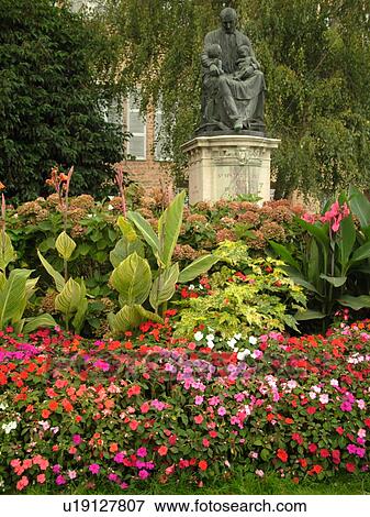 Stock Photo -  France, Chatillon, Ain, Rhone-Alpes, Europe, village, park, gardens, statue of St Vincent de Paul. Fotosearch