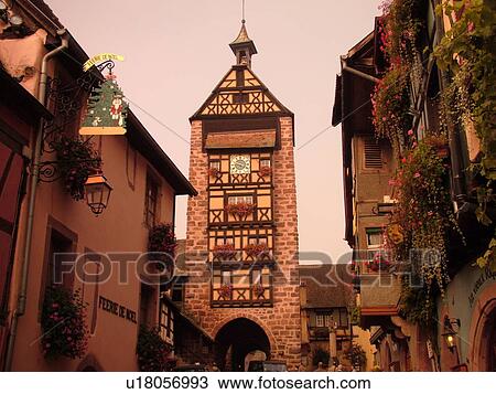 France, Dolder Tour Beffroi, Europe, Alsace, Riquewihr, Haut-Rhin, L'Alsace Wine Region, Route du Vin, downtown, half-timbered buildings, 13th century city gate, bell tower, clock tower View Large Photo Image Stock Image - France, Dolder Tour Beffroi, Europe, Alsace, Riquewihr, Haut-Rhin, L'Alsace Wine Region, Route du Vin, downtown, half-timbered buildings, 13th century city gate, bell tower, clock tower. Fotosearch