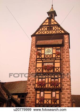 France, Dolder Tour Beffroi, Europe, Alsace, Riquewihr, Haut-Rhin, L'Alsace Wine Region, Route du Vin, downtown, half-timbered buildings, 13th century city gate, bell tower, clock tower View Large Photo Image Stock Photo - France, Dolder Tour Beffroi, Europe, Alsace, Riquewihr, Haut-Rhin, L'Alsace Wine Region, Route du Vin, downtown, half-timbered buildings, 13th century city gate, bell tower, clock tower. Fotosearch